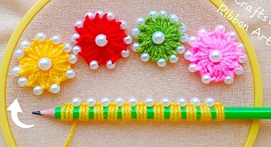 Interesting idea with a pencil to create a magnificent flower from thread